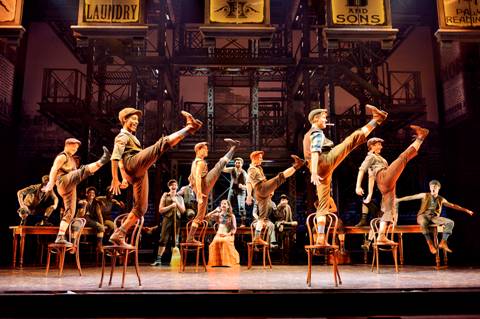 The cast of NEWSIES dancing