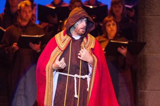JAY  STEELE as Archdeacon Frollo with some members of the 33 voice choir