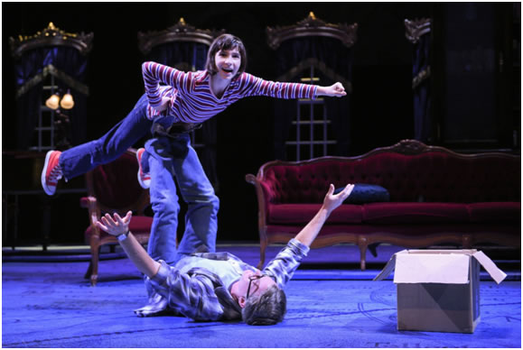 Small Alison (Lila Gold) being taught to fly by Bruce (James Lloyd Reynolds)